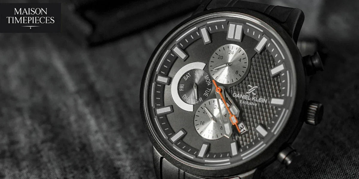"Close-up of Daniel Klein chronograph-style watch with textured black dial — Maison Timepieces product photo"