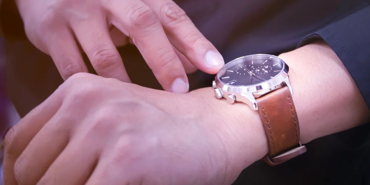 Elegant Dior-inspired luxury watch worn on wrist with leather strap, showcasing refined design in Singapore