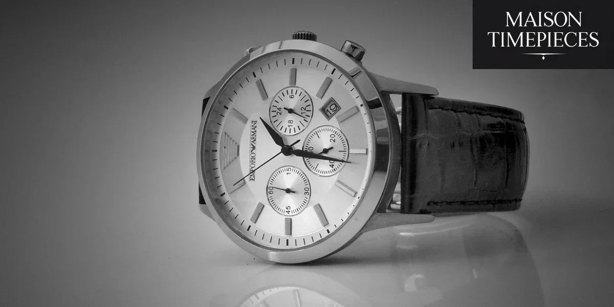 A luxury Emporio Armani men’s watch with leather strap photographed in a minimalist studio setup.
