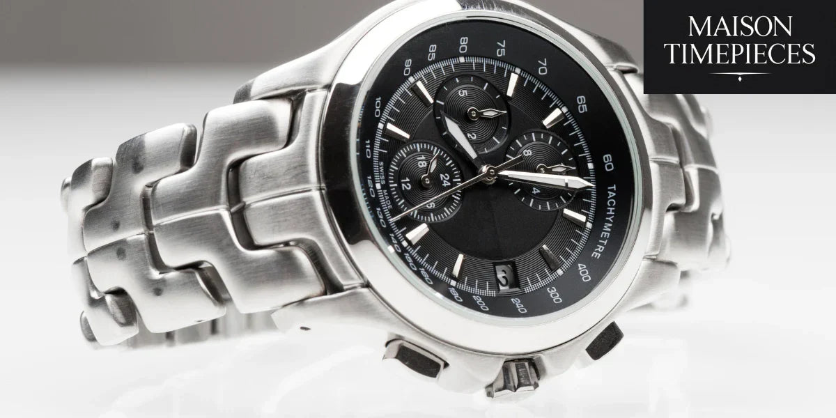 Luxury silver chronograph men watch with black dial showcasing timeless craftsmanship and masculine elegance