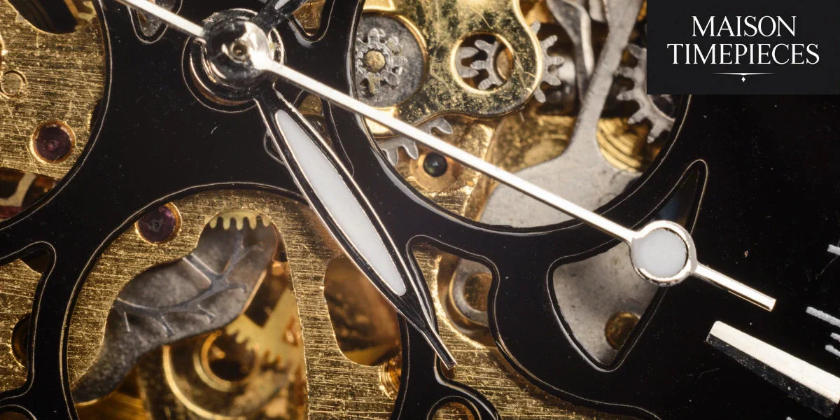 Close-up of Longines watch hands and mechanical gears in gold and black by Maison Timepieces