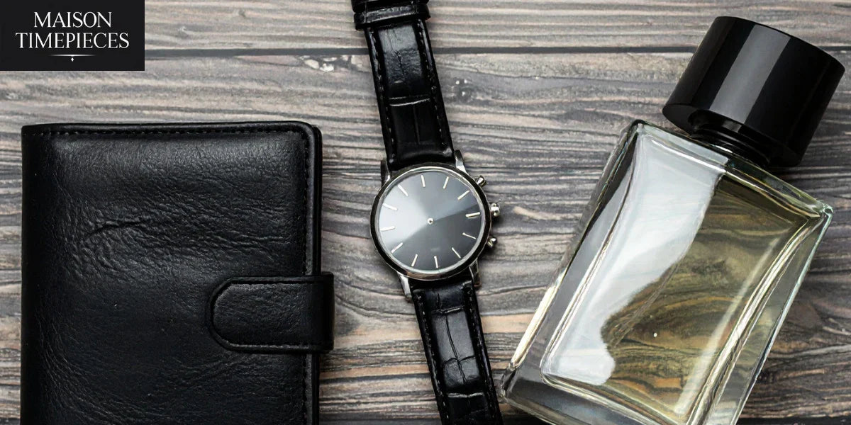 Piaget watch with black leather strap beside wallet and perfume bottle – Maison Timepieces Singapore