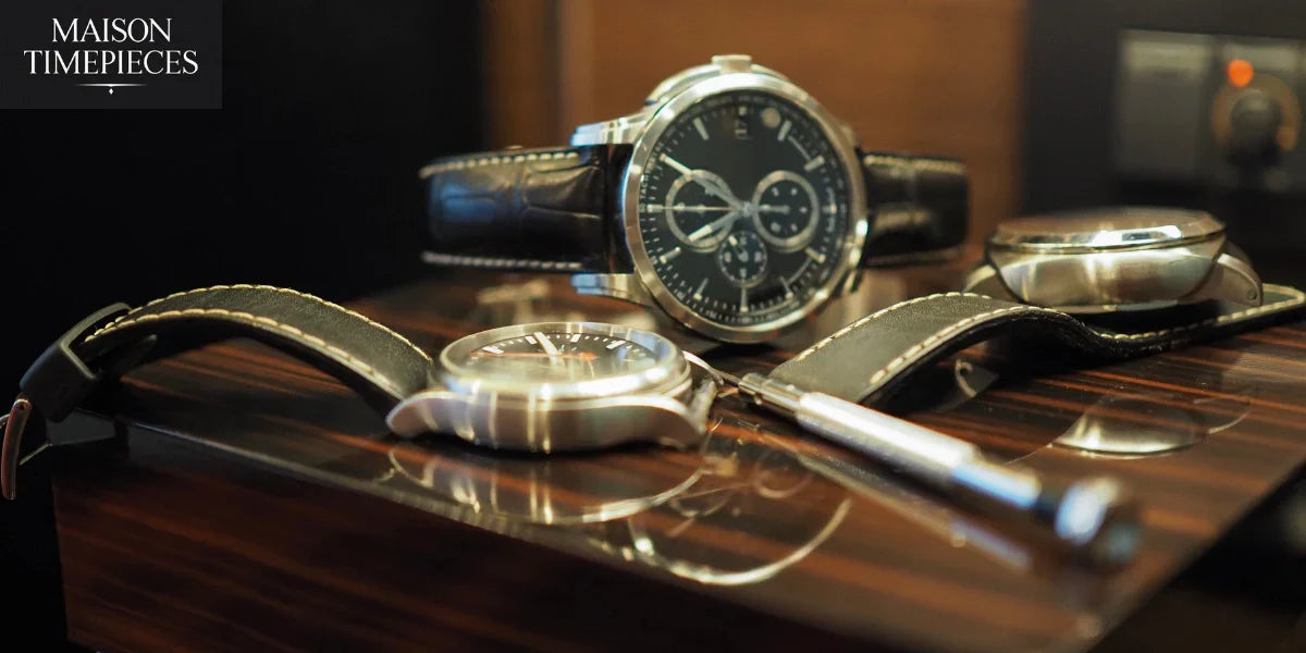 Collection of vintage watches with leather straps in Singapore, displayed by Maison Timepieces