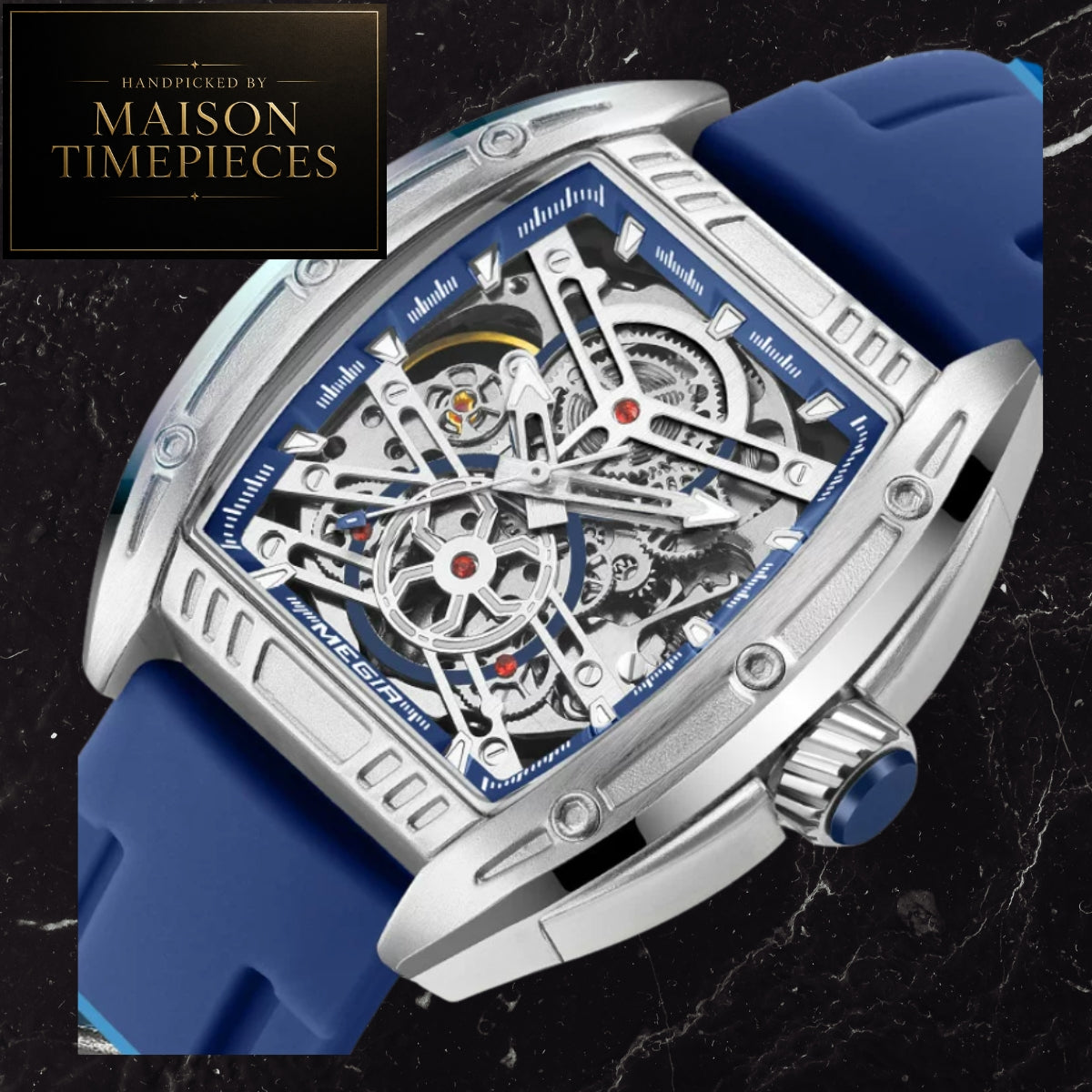 A close-up of a Maison Timepieces skeleton watch with a blue silicone strap, silver-toned case, and intricate blue and silver dial mechanism, set against a dark marble background with a Maison Timepieces logo in the top-left corner.