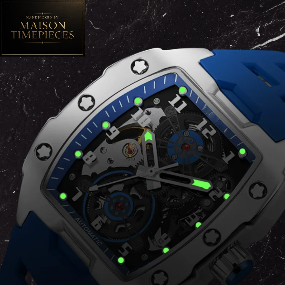 Maison Timepieces Curated automatic skeleton sports watch with 43mm black tonneau case, visible mechanical movement, orange silicone strap, luminous hands and transparent exhibition caseback.