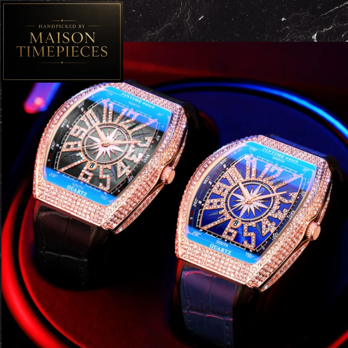 Two luxury watch models from Maison Timepieces displayed side-by-side. The watches feature rectangular rounded corners, rose gold-tone cases encrusted with pavé stones, and vibrant blue and navy blue dial faces with gold Roman numerals and starburst centers.