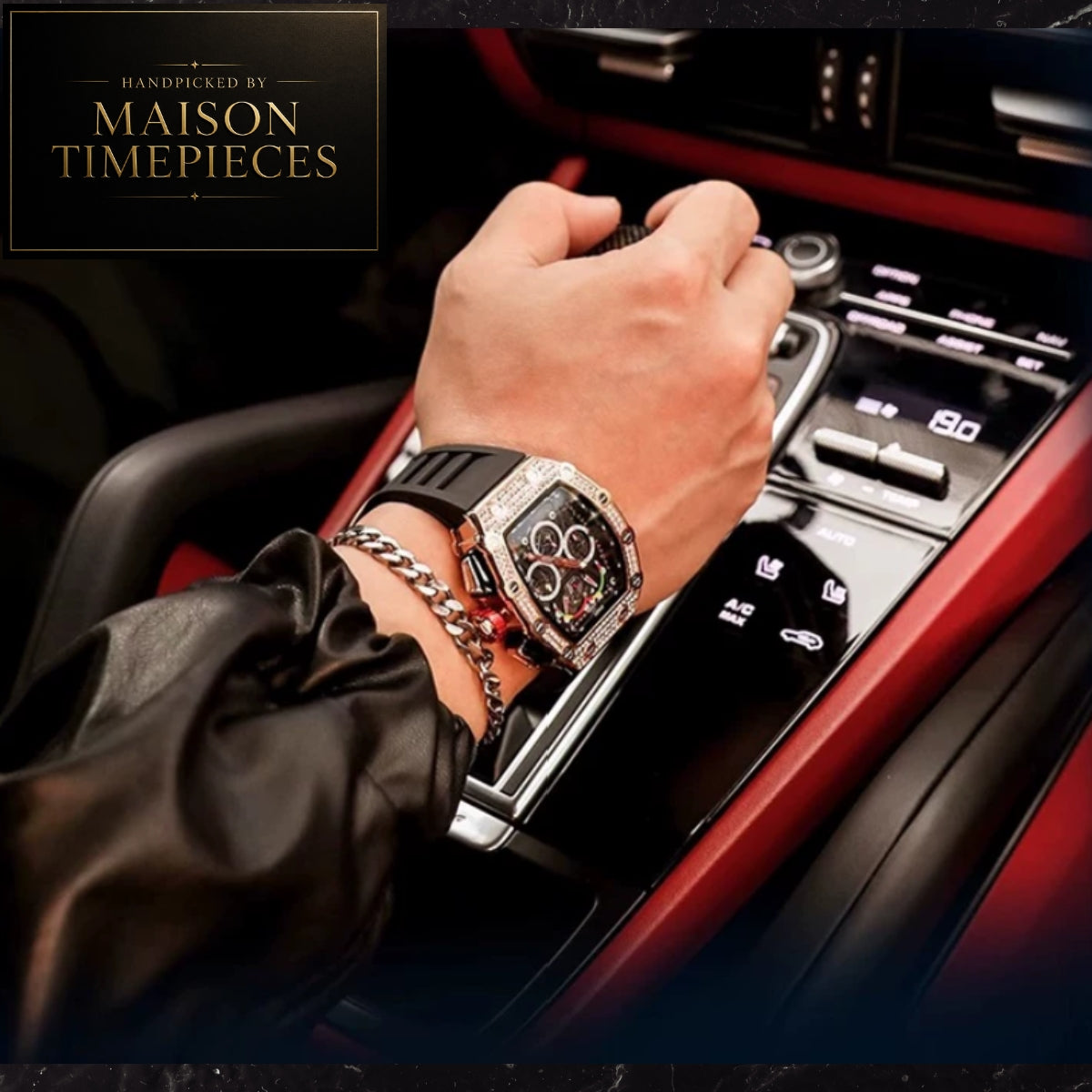 A luxury wristwatch with a square bezel, black strap, and silver-toned details, worn on a person's wrist inside a car. The image includes a 'Handcrafted by Maison Timepieces' logo overlay in the top-left corner.