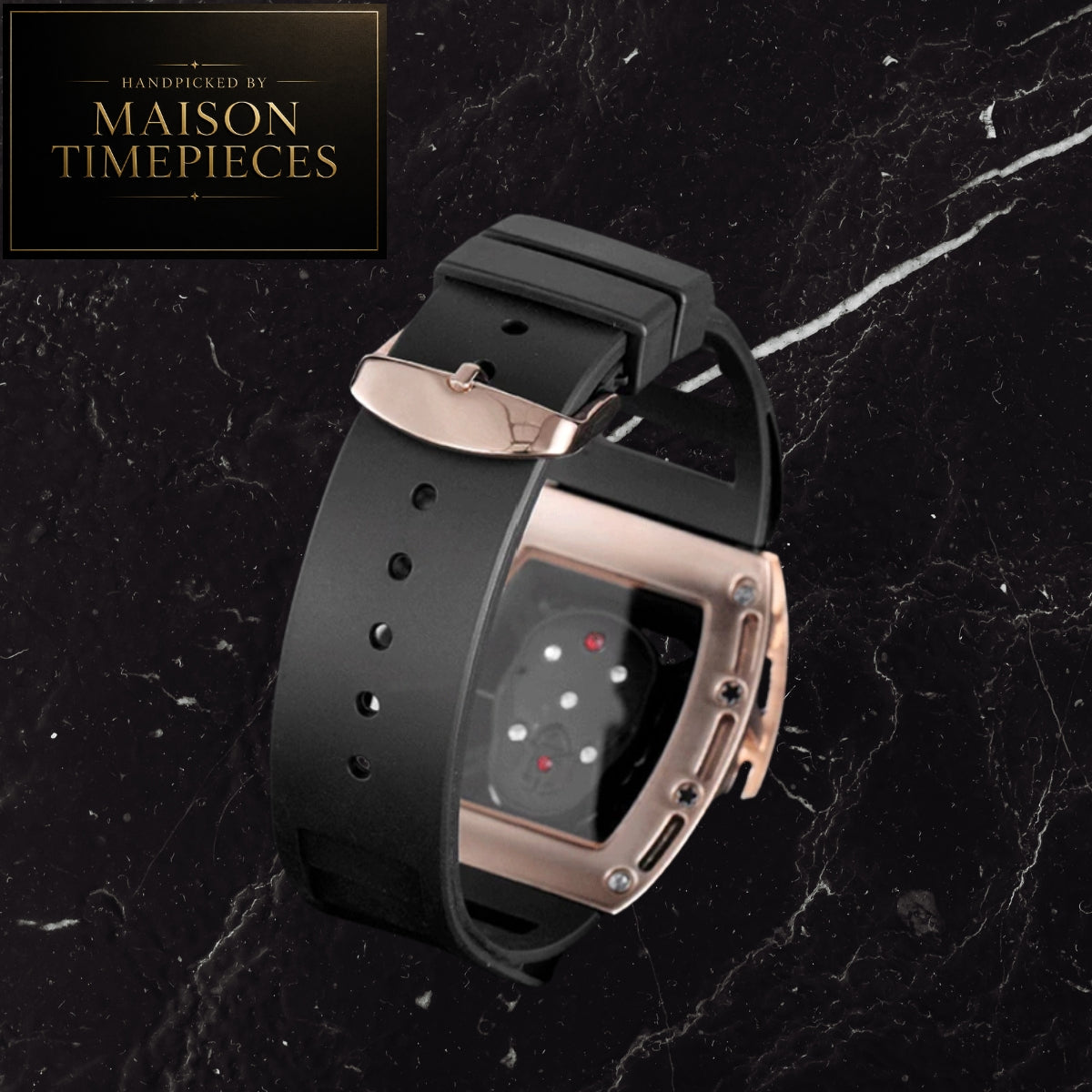 A smartwatch with a matte black silicone strap and a metallic rose gold case, displayed on a black marble background with a Maison Timepieces logo in the top-left corner.
