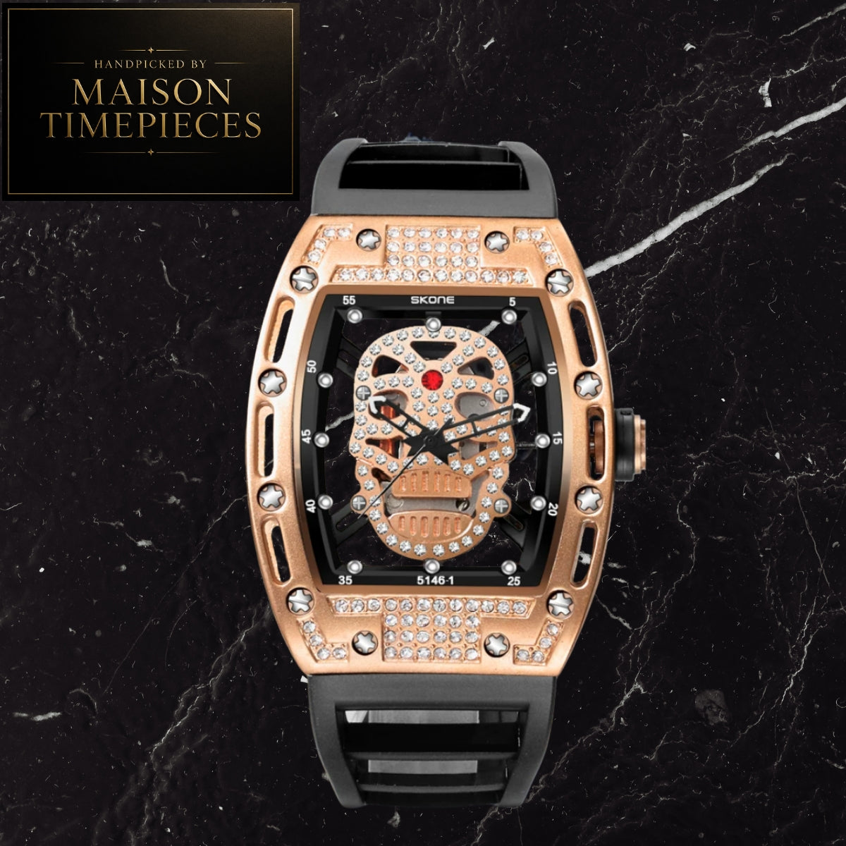 A luxury skeleton wristwatch by Maison Timepieces, featuring a rose gold case encrusted with diamonds, a black dial with a skull motif, and a black rubber strap, set against a black marble background.
