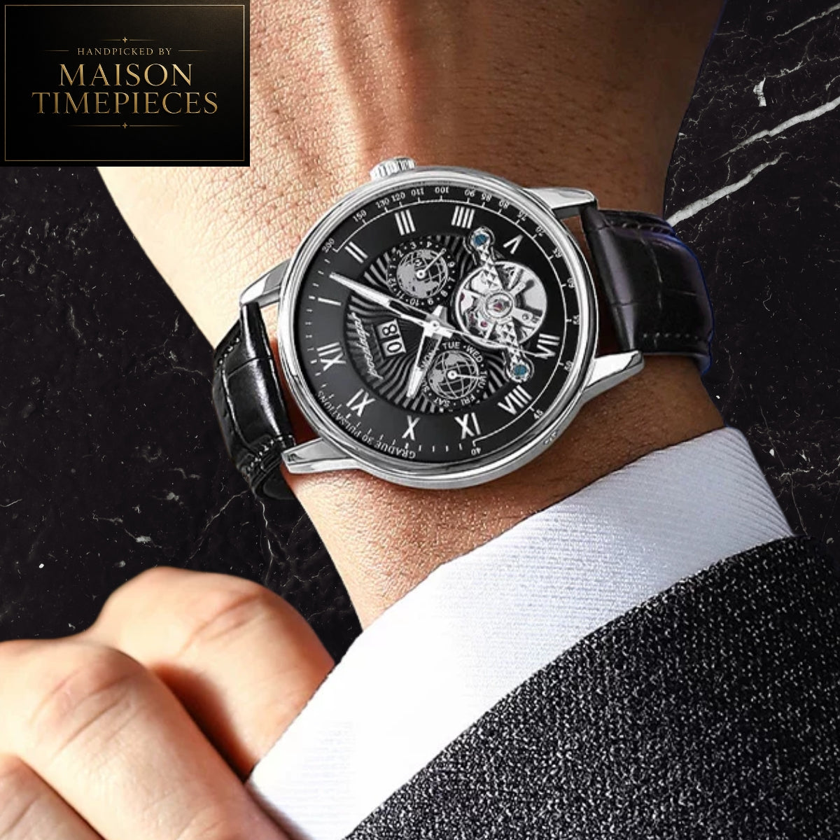 Maison Timepieces Curated automatic skeleton dress watch with black Roman numeral dial, open-heart mechanical movement display, stainless steel case and black leather strap.