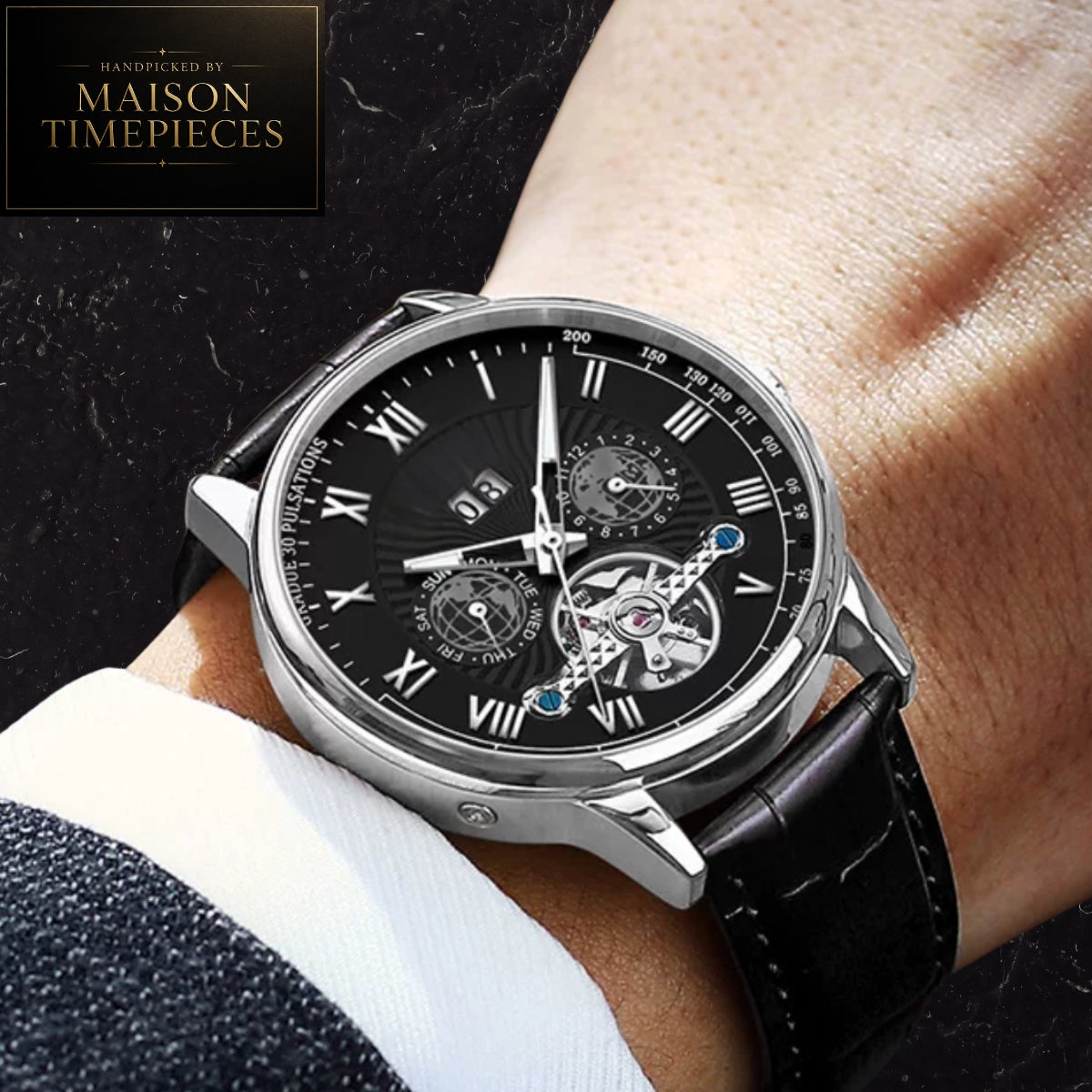 Maison Timepieces Curated automatic skeleton dress watch with black Roman numeral dial, open-heart mechanical movement display, stainless steel case and black leather strap.