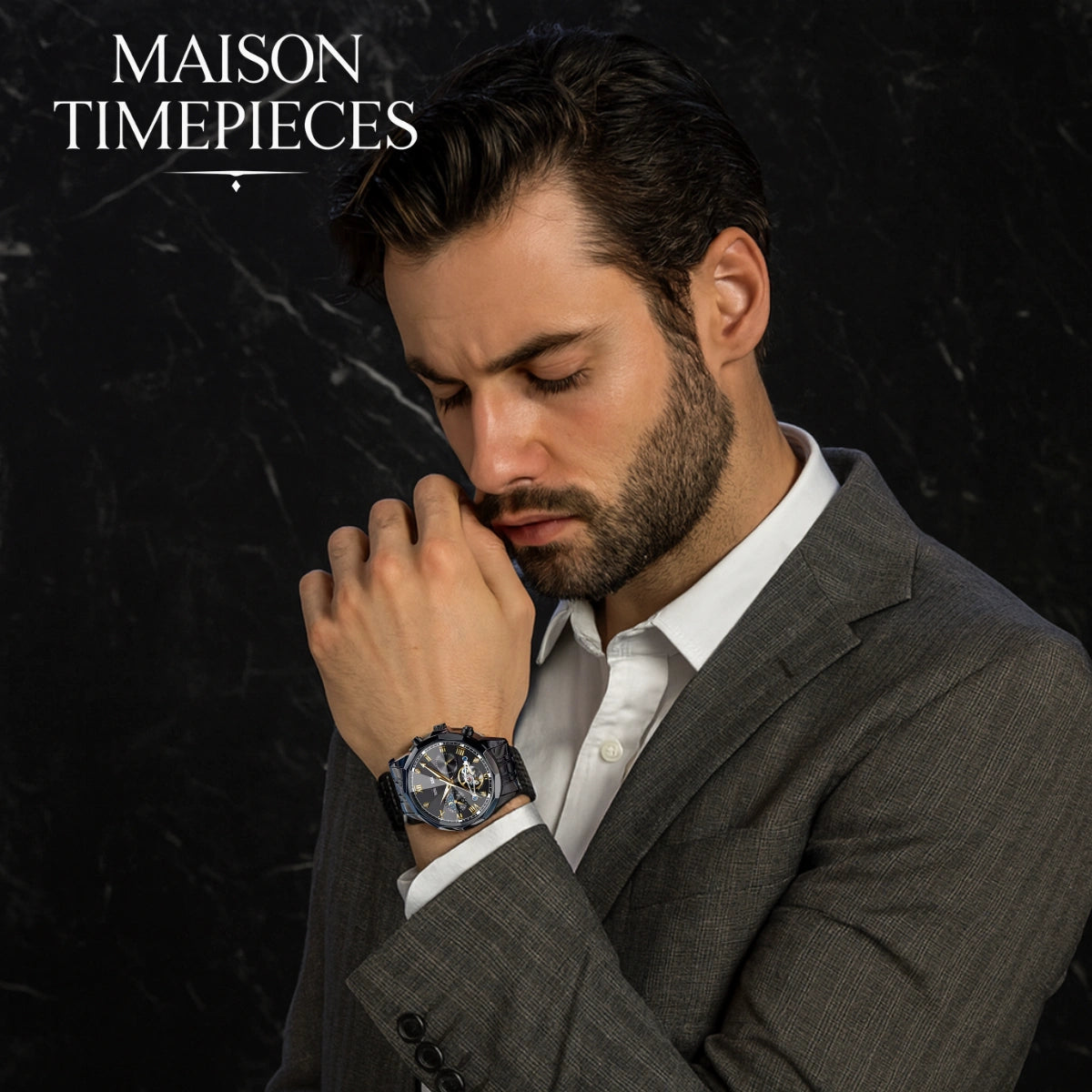 Man in a suit looking at a watch with 'MAISON TIMEPIECES' branding.