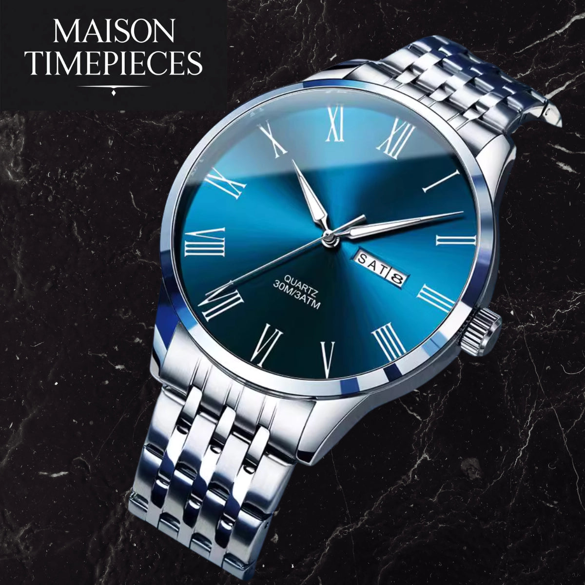 Silver watch with blue face on a dark marble background, branded 'Maison Timepieces'.