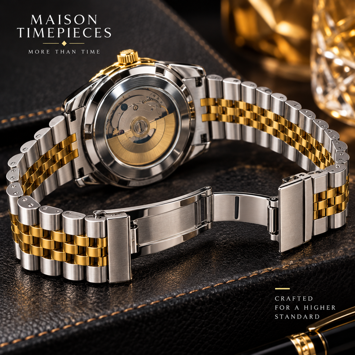 Close-up of silver dial automatic watch with gold markers and crystal-set bezel
