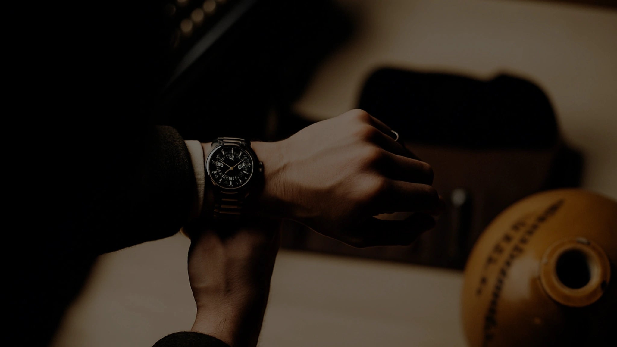 Close-up of a luxury men's watch on wrist in a stylish setting — Maison Timepieces Singapore