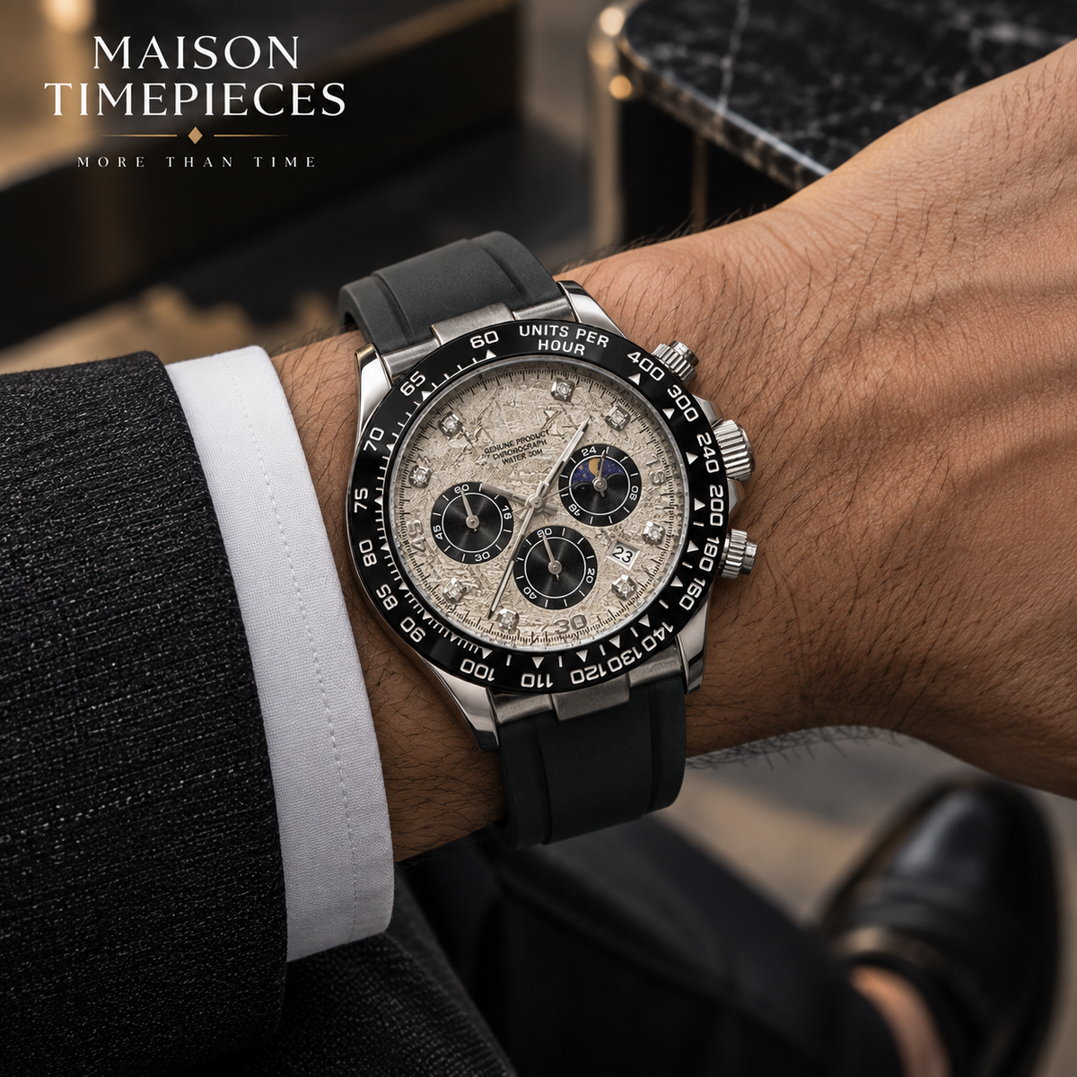 Full view of men's luxury chronograph watch with textured dial and black rubber strap.