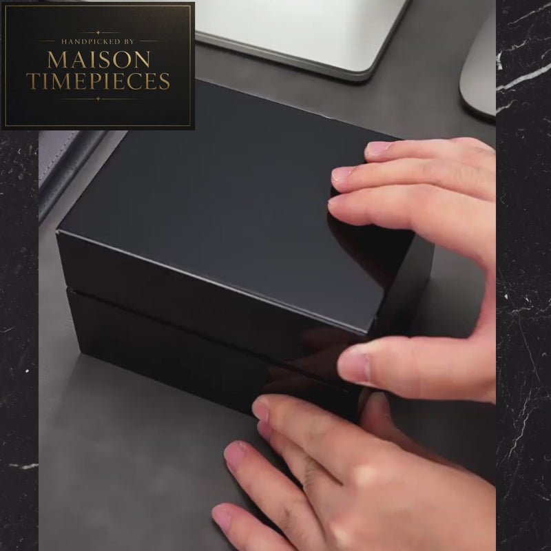 Maison Timepieces Curated galaxy star dial quartz watch with black celestial textured dial, luminous hands, 41mm stainless steel case and stainless steel bracelet.