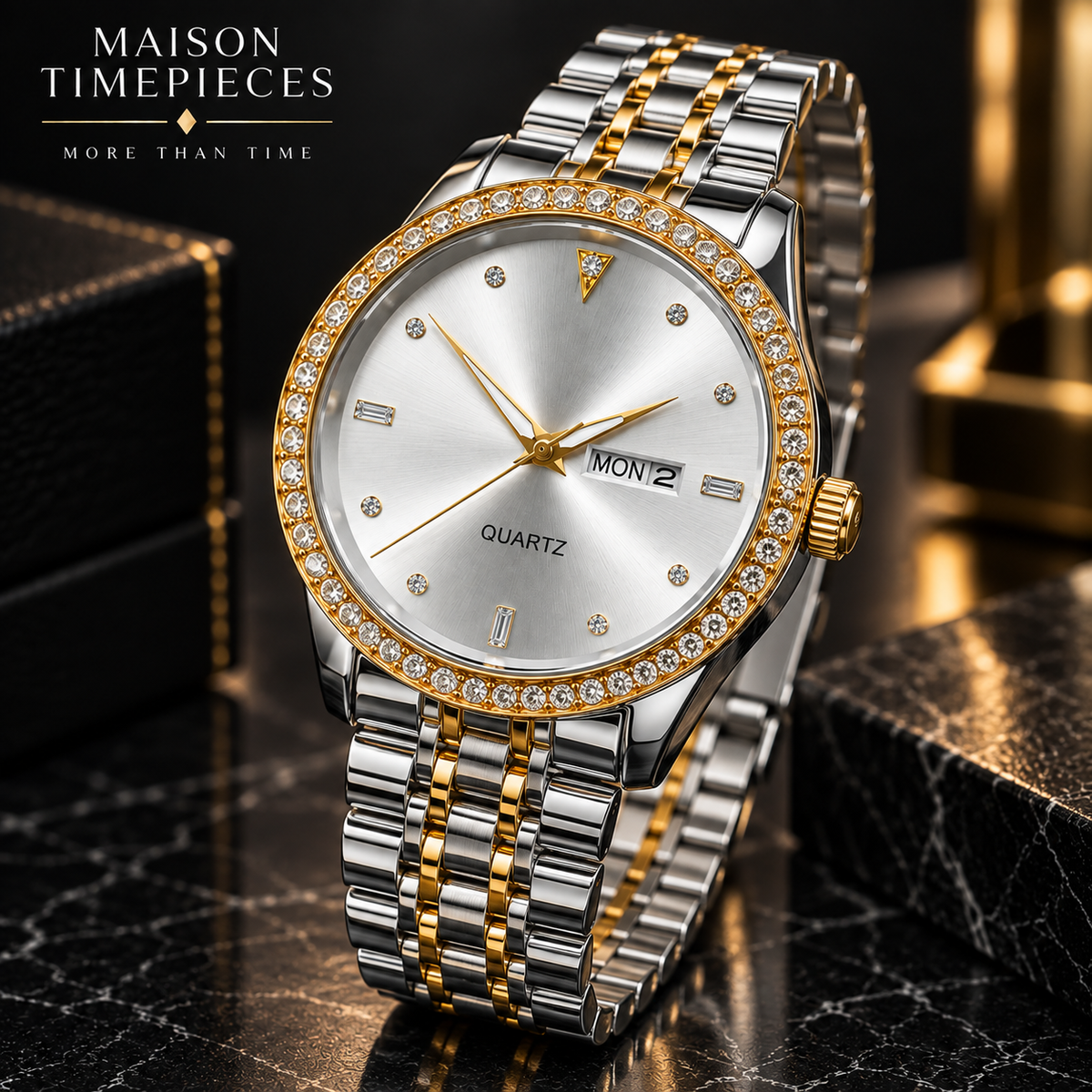 A Maison Timepieces men's quartz watch with a silver and gold two-tone stainless steel link bracelet, a gold bezel encrusted with clear crystals, and a white dial with a day and date window.