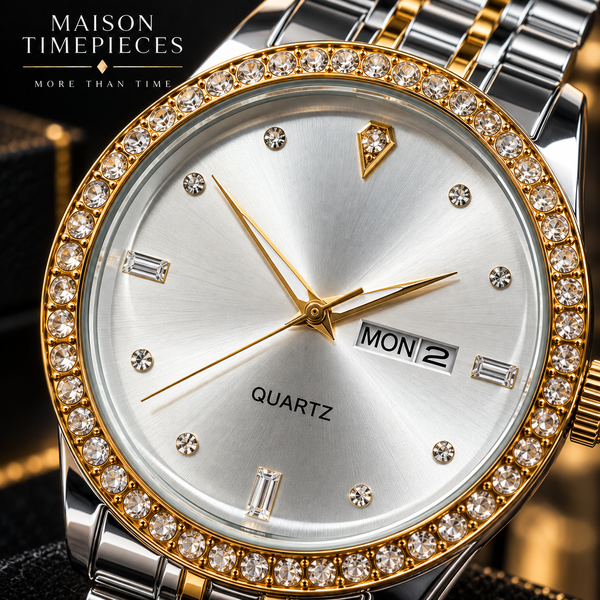 A close-up of a Maison Timepieces quartz watch with a silver sunburst dial, gold-tone hands and markers, a diamond-encrusted bezel, and a two-tone silver and gold stainless steel link bracelet.