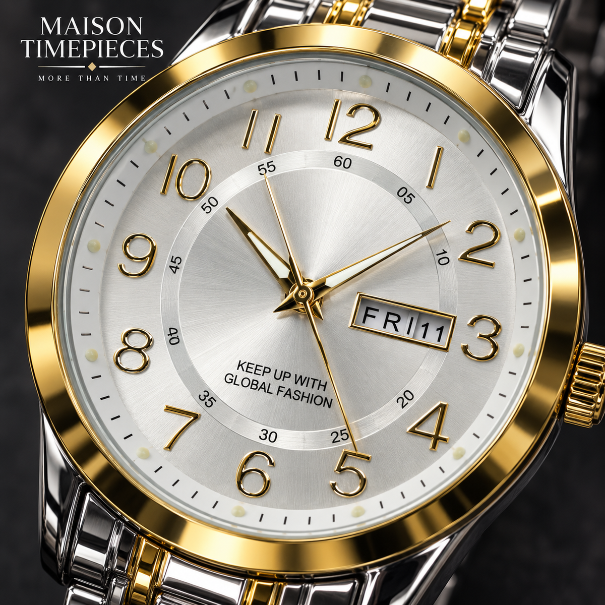 Gold and silver two-tone wristwatch styled with a dark business suit
